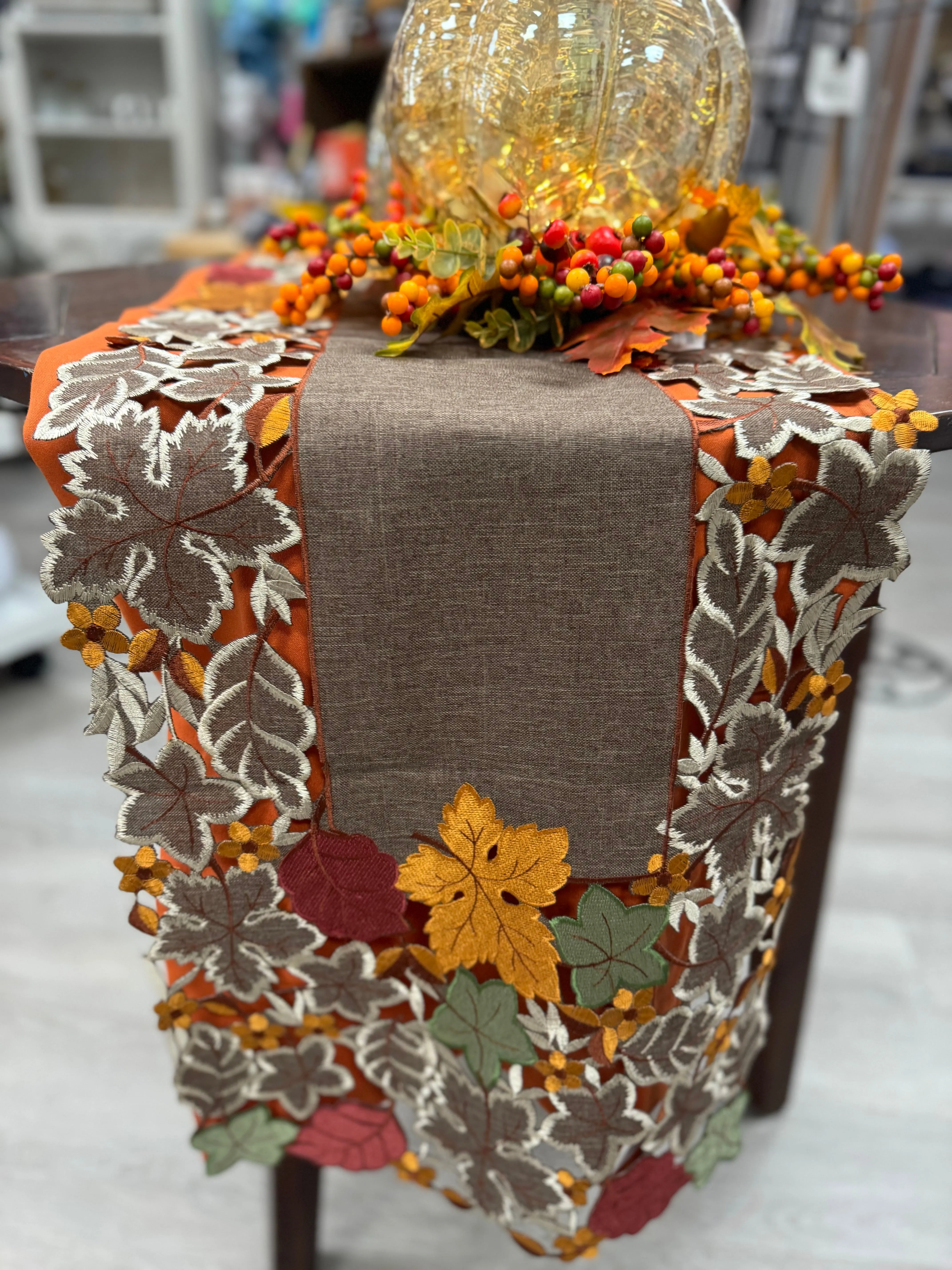 Embroidered cutout fall leaves table runner